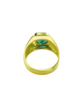 The underside view of a yellow gold women's emerald ring