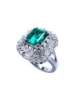 Vintage 2.40 ct Colombian emerald ring in 14K white gold with diamond accents.