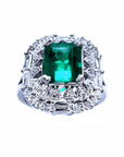 A vintage authentic Colombian emerald ring and accent diamonds in white gold.