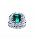 Vintage 2.40 ct Colombian emerald ring in 14K white gold with diamond accents.