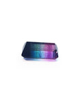 Rectangular emerald cut watermelon tourmaline with vibrant red-orange, bluish-green, and purple hues.