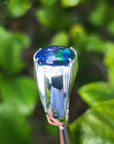 Men's sterling silver ring with a sparkling blue, red, and green Welo black opal.