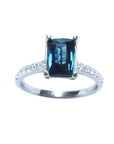 18k white gold blue sapphire ring for women sparkling radiant cut solitaire, showcasing a rich deep blue hue.