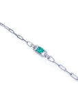 14K white gold paper clip bracelet with a rectangular emerald and diamond halo.