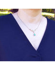 1.88 carat natural Colombian emerald necklace in 14K white/yellow gold, featuring a pear-shaped emerald.