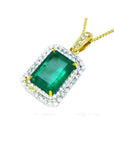 18K yellow gold emerald pendant with a rectangular emerald-cut stone and double halo natural diamonds.