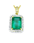 18K yellow gold emerald pendant with a rectangular emerald-cut stone and double halo natural diamonds.