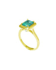1.22 carat emerald-cut Muzo Colombian emerald solitaire ring in 14K yellow gold.