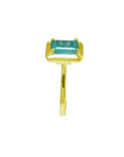 1.22 carat emerald-cut Muzo Colombian emerald solitaire ring in 14K yellow gold.