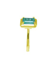 1.22 carat emerald-cut Muzo Colombian emerald solitaire ring in 14K yellow gold.