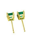 A pair of 14k gold emerald stud earrings downside gallery and push back's systems view.