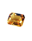 Loose yellow sapphire emerald cut from Sri Lanka, ideal for crafting a ring, pendant, or necklace.