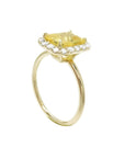 14K yellow gold ring with emerald-cut natural yellow sapphire and diamond halo.