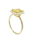 14K yellow gold ring with emerald-cut natural yellow sapphire and diamond halo.