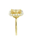 14K yellow gold ring with emerald-cut natural yellow sapphire and diamond halo.
