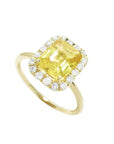 14K yellow gold ring with emerald-cut natural yellow sapphire and diamond halo.