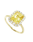 14K yellow gold ring with emerald-cut natural yellow sapphire and diamond halo.