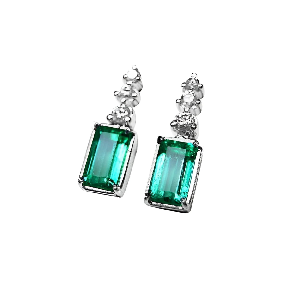 Emerald earrings with rectangular medium bluish-green emeralds and accent diamonds in 14K white gold.