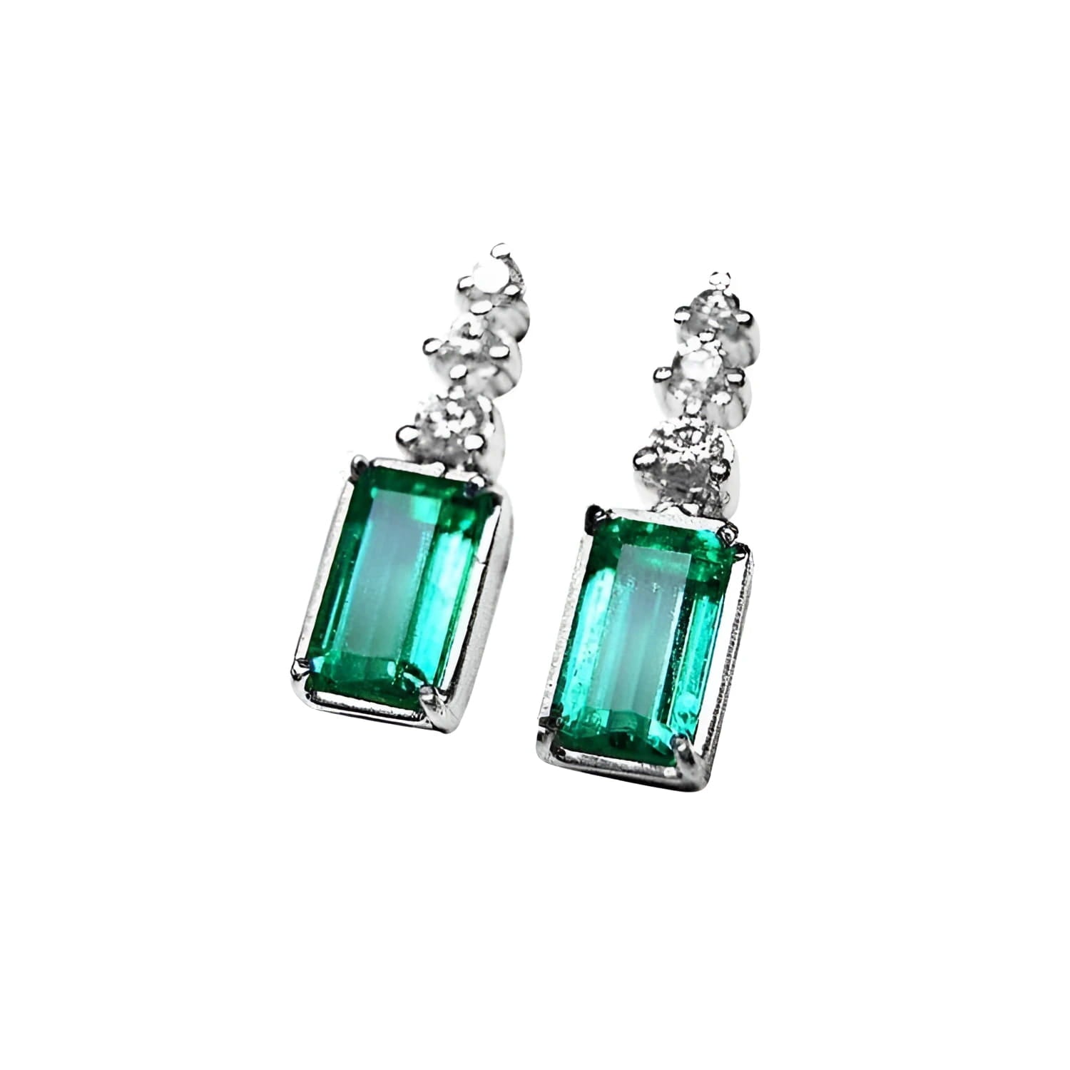 Emerald earrings with rectangular medium bluish-green emeralds and accent diamonds in 14K white gold.
