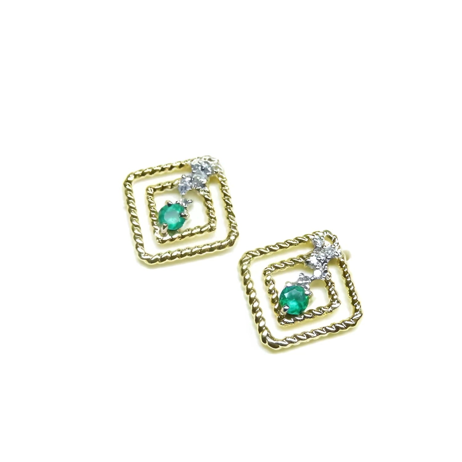 Emerald braided geometric stud earrings in 14K yellow gold with white accents.