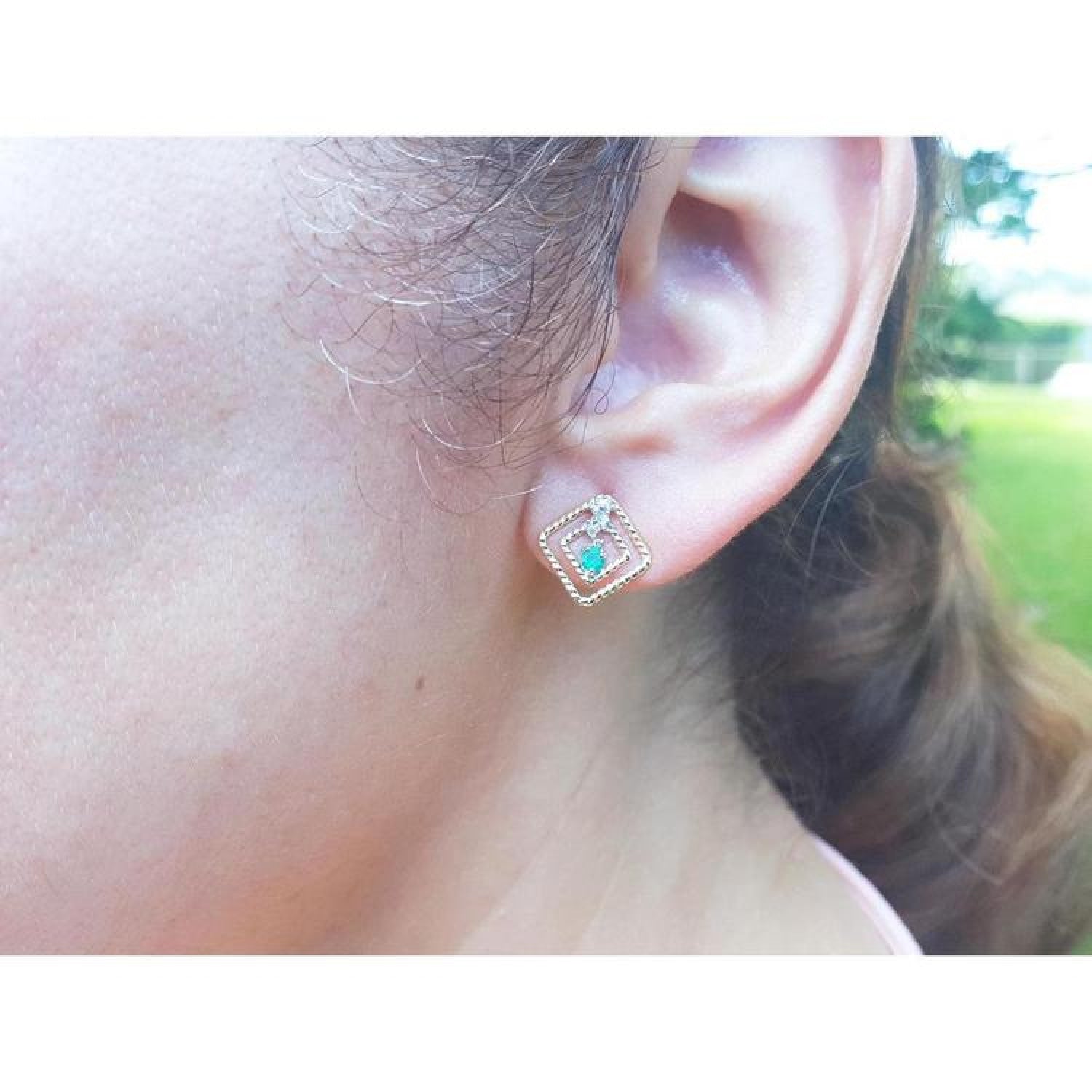 Women's emerald braided stud earrings, 14K yellow gold double kite geometric design with push backs.