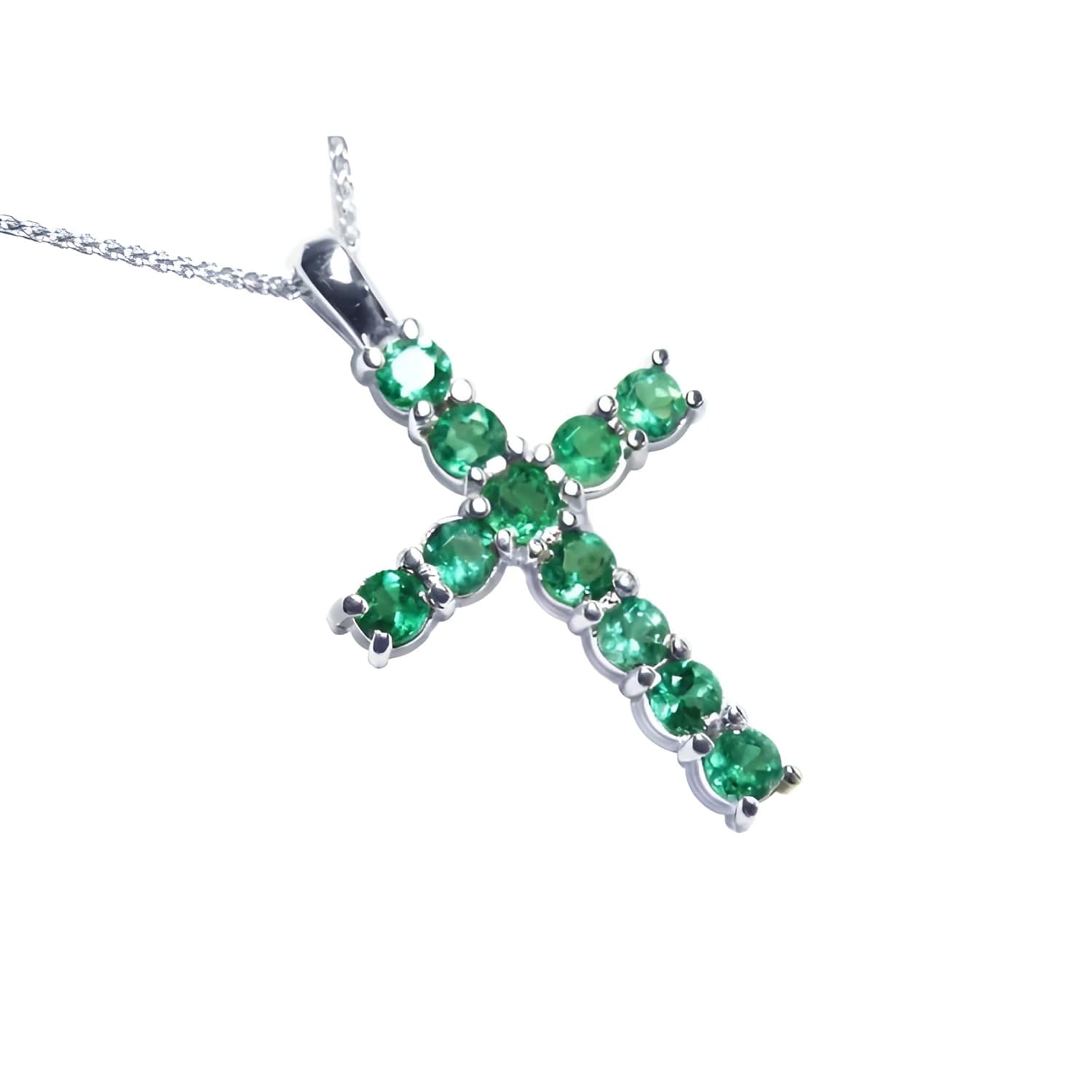 18K white gold cross pendant with eleven round-cut natural Colombian emeralds.