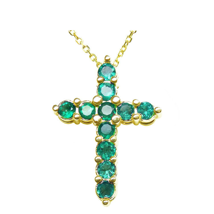The emerald cross pendant necklace collection showcases genuine Colombian emeralds set in your choice of 18k or 14k gold, expertly crafted by Emeralds & Jewelry Corp.