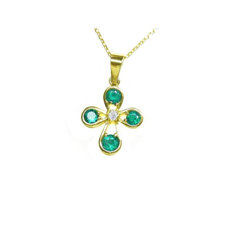 Gold necklace with a natural emeralds pendant on a topside position display.