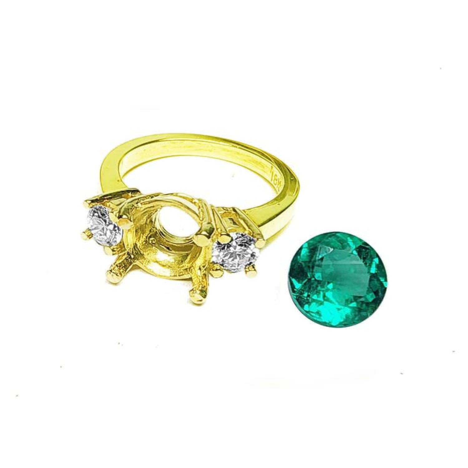 18K yellow gold three-stone ring setting with two round diamonds and a separate 2.44 ct. Colombian emerald.