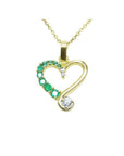 18K yellow gold heart pendant with natural emeralds and diamonds on a delicate chain.