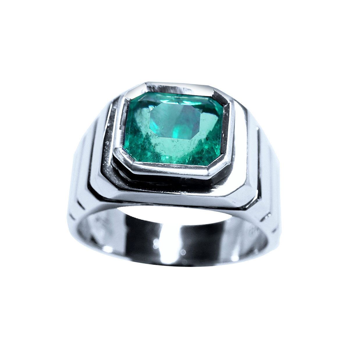 A 18k white gold men's solitaire emerald ring displaying its top bezel setting and sides profile.