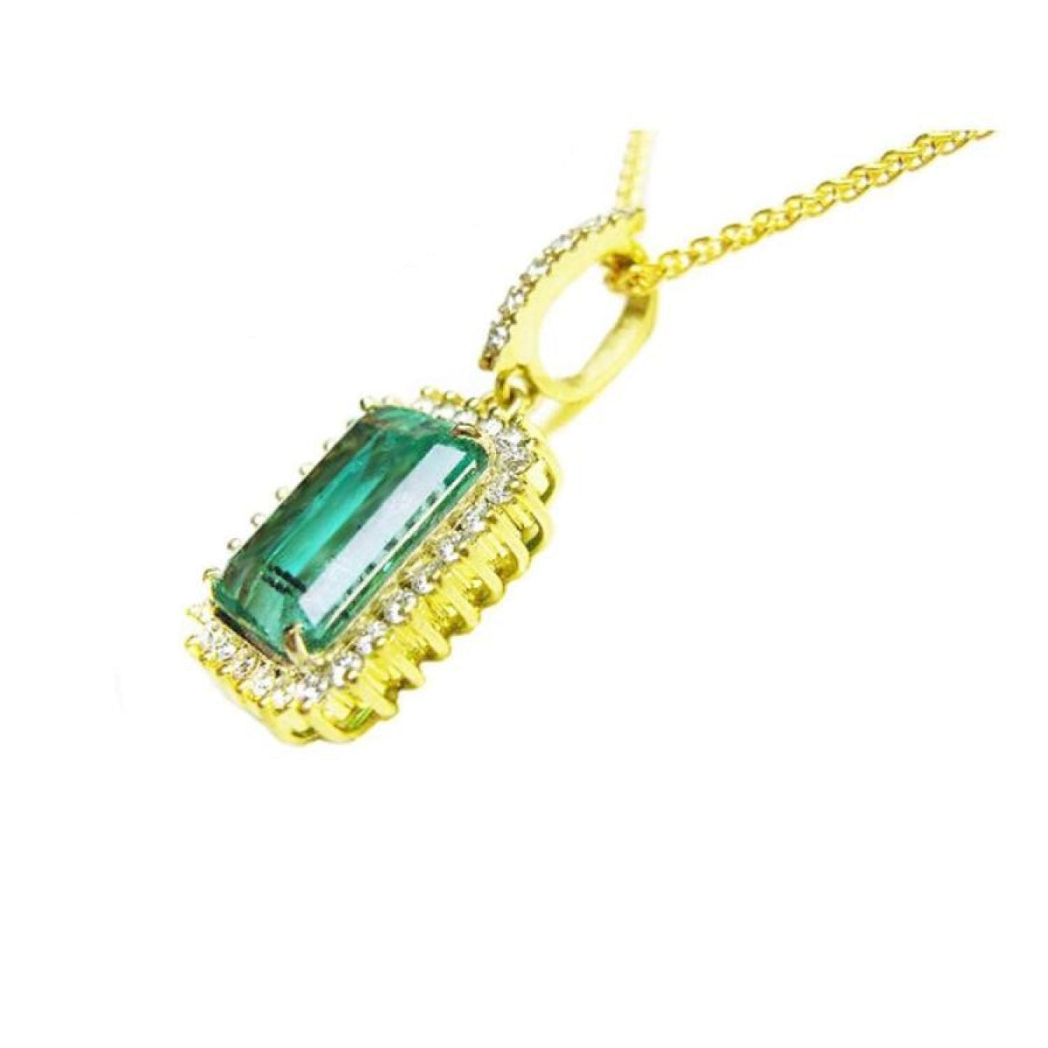 8.04 ct. emerald-cut emerald pendant with halo diamonds in 18K gold, featuring a medium dark green Colombian emerald.