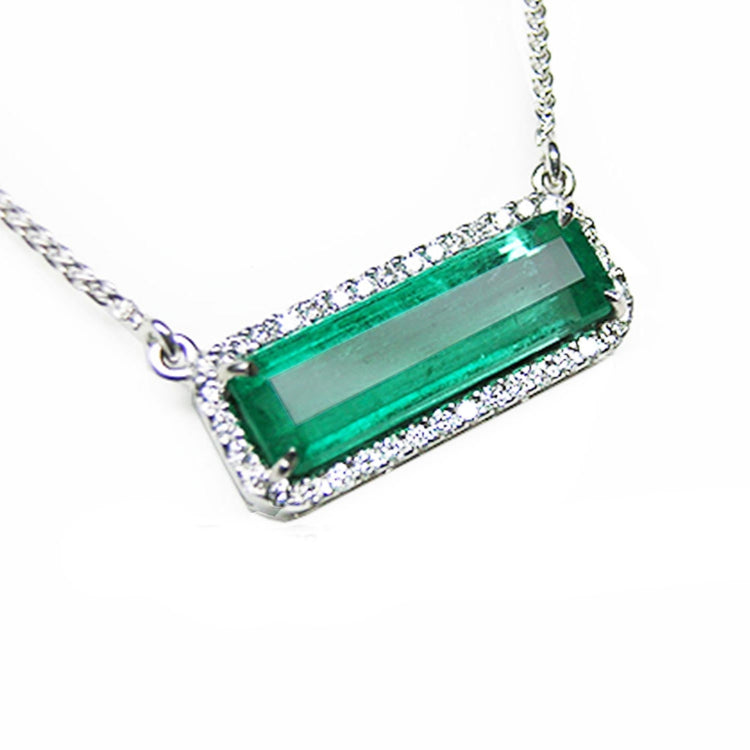 Emerald necklace elongated natural Colombian emerald 3.48 carats east west orientation crafted in 18k white gold