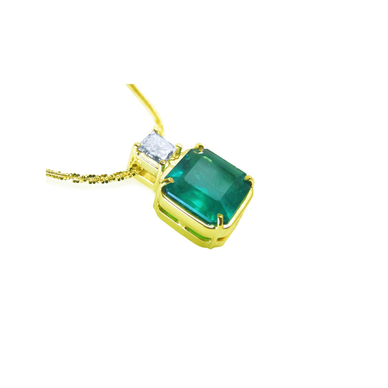 18K yellow gold necklace with a large asscher cut Colombian emerald and a princess cut diamond.
