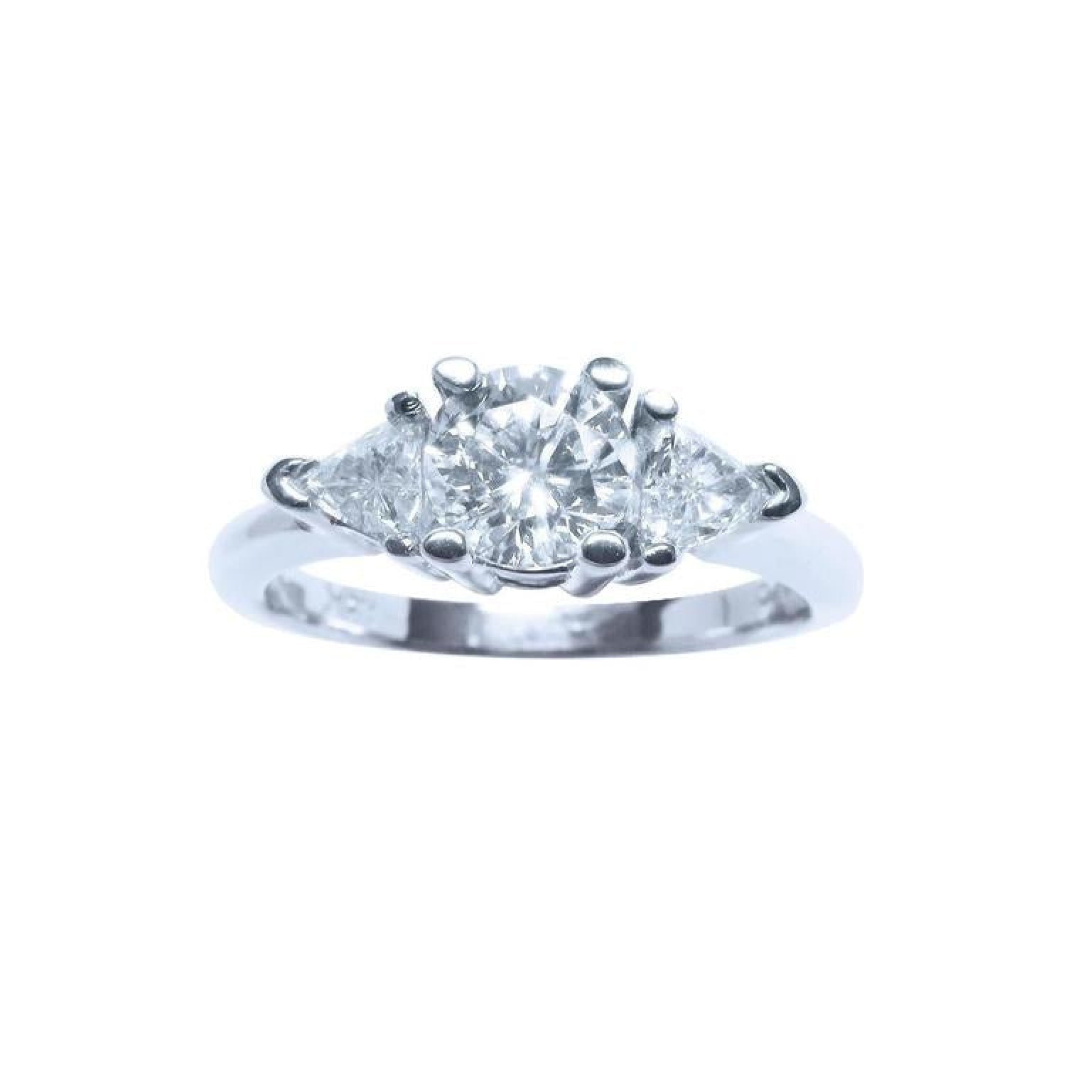 Round cut center diamond 0.61 ct. and trillion side 0.36 ct. all natural diamonds made in14k solid white gold ring.