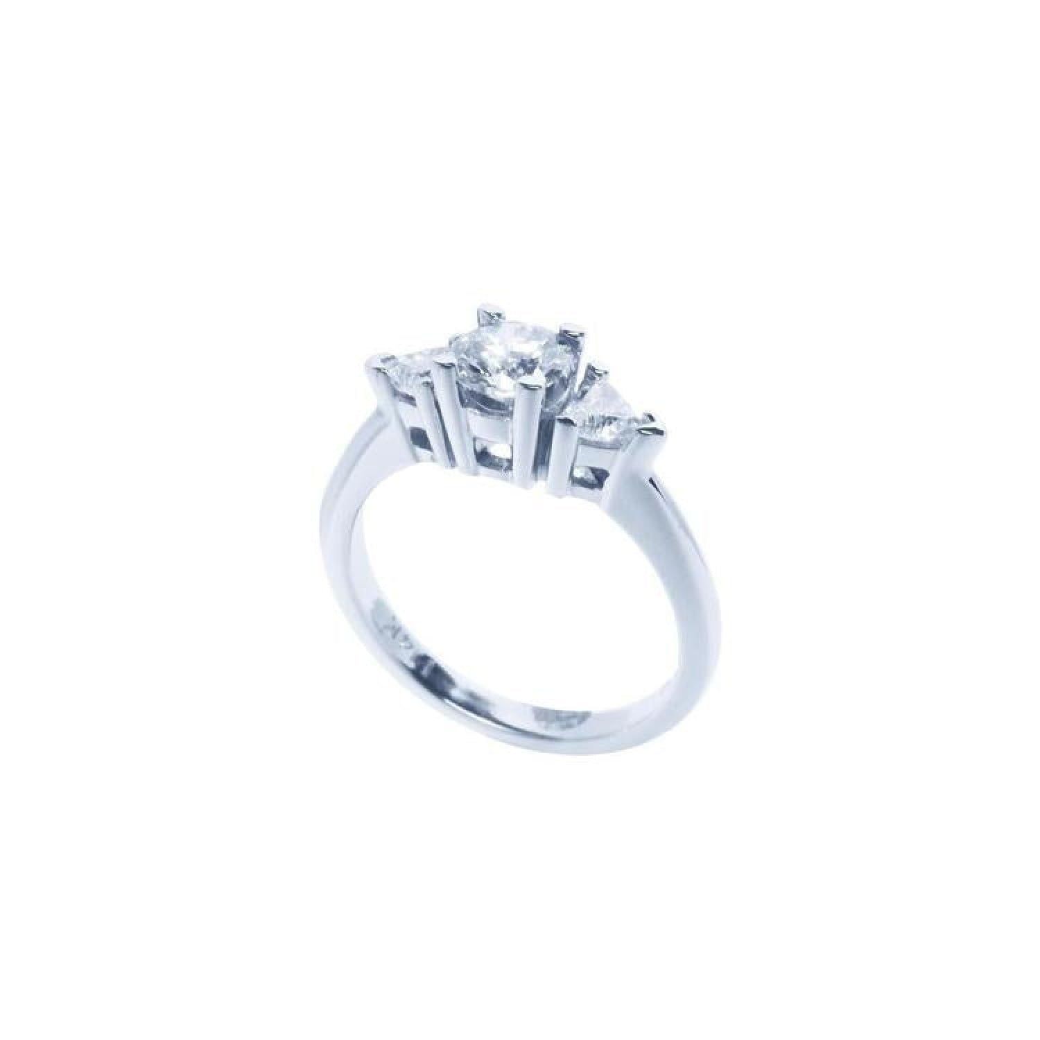 14K white gold engagement ring with a round center diamond and two trillion side diamonds.