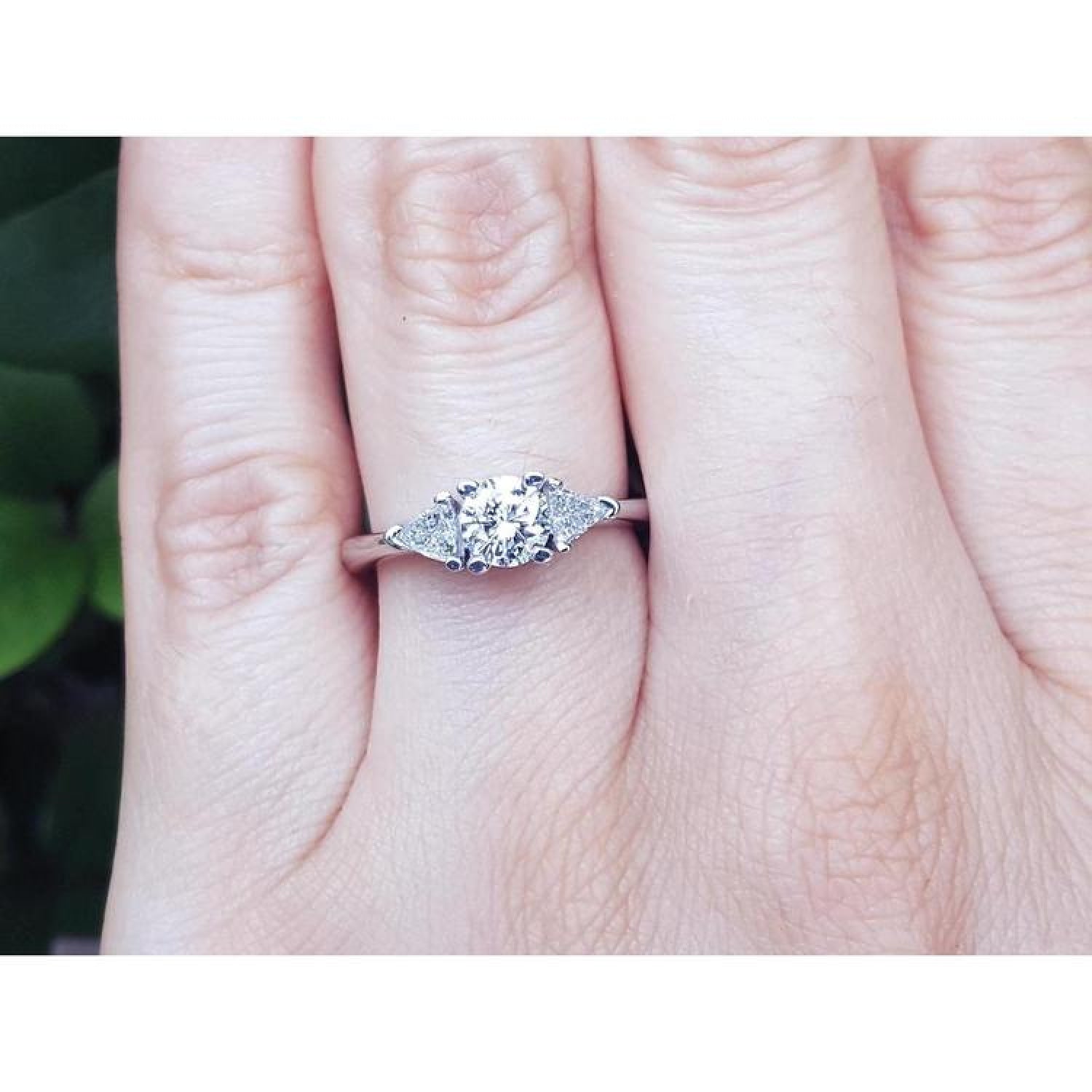 Natural three stone trillion side diamond ring for women in 14k white gold.