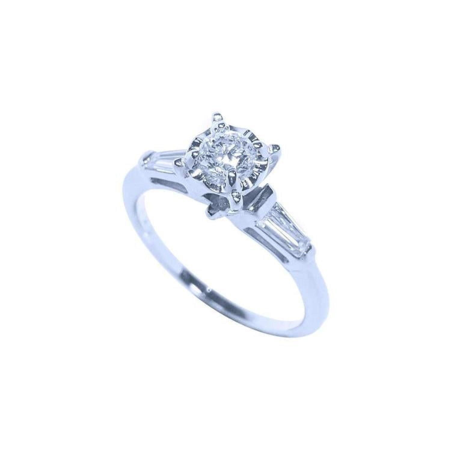 14k white gold engagement ring with a round diamond center and baguette side stones.