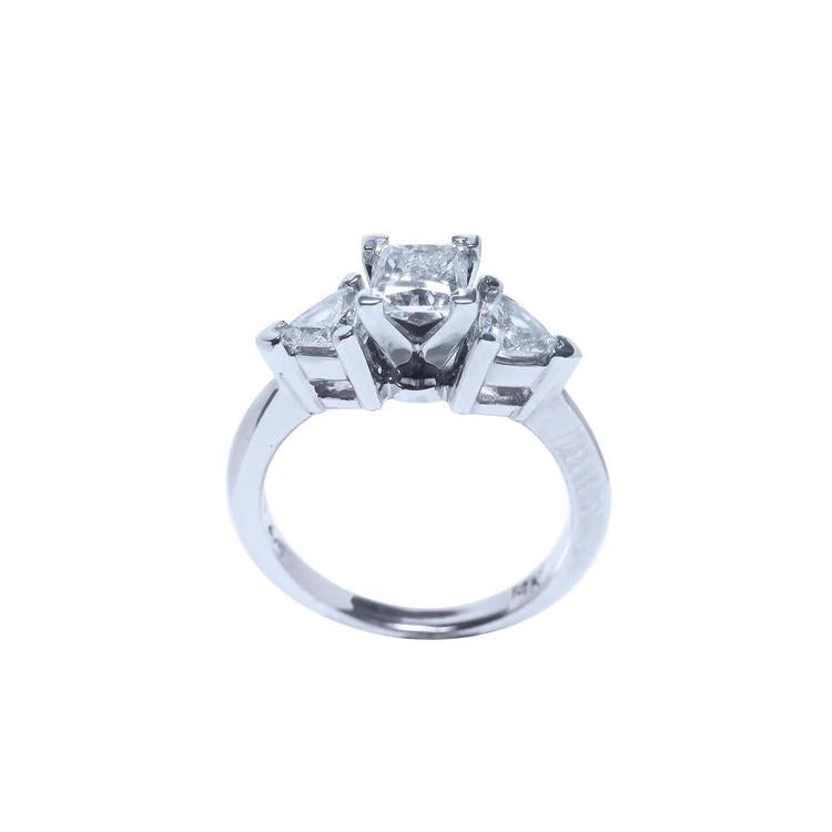 14K white gold ring with a princess cut diamond center and two trillion side diamonds.