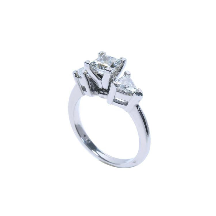 14K white gold ring with a princess cut diamond center and two trillion side diamonds.