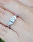 trillion side three stone diamond ring