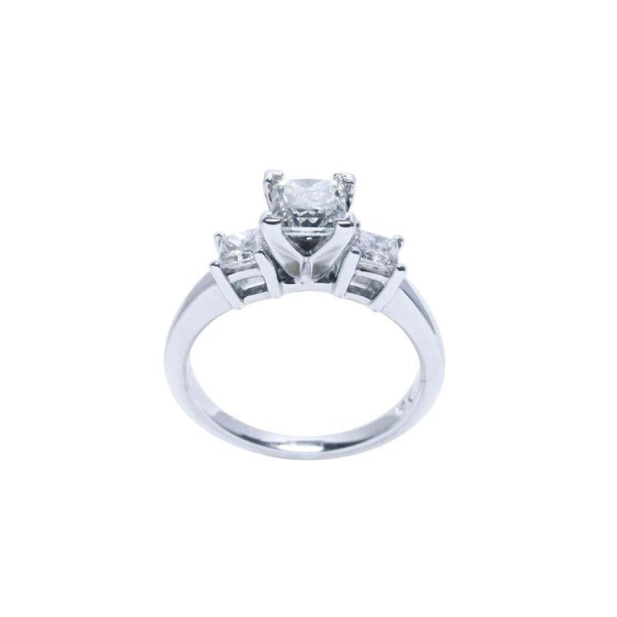 14K white gold ring with a princess cut three-stone diamond design.
