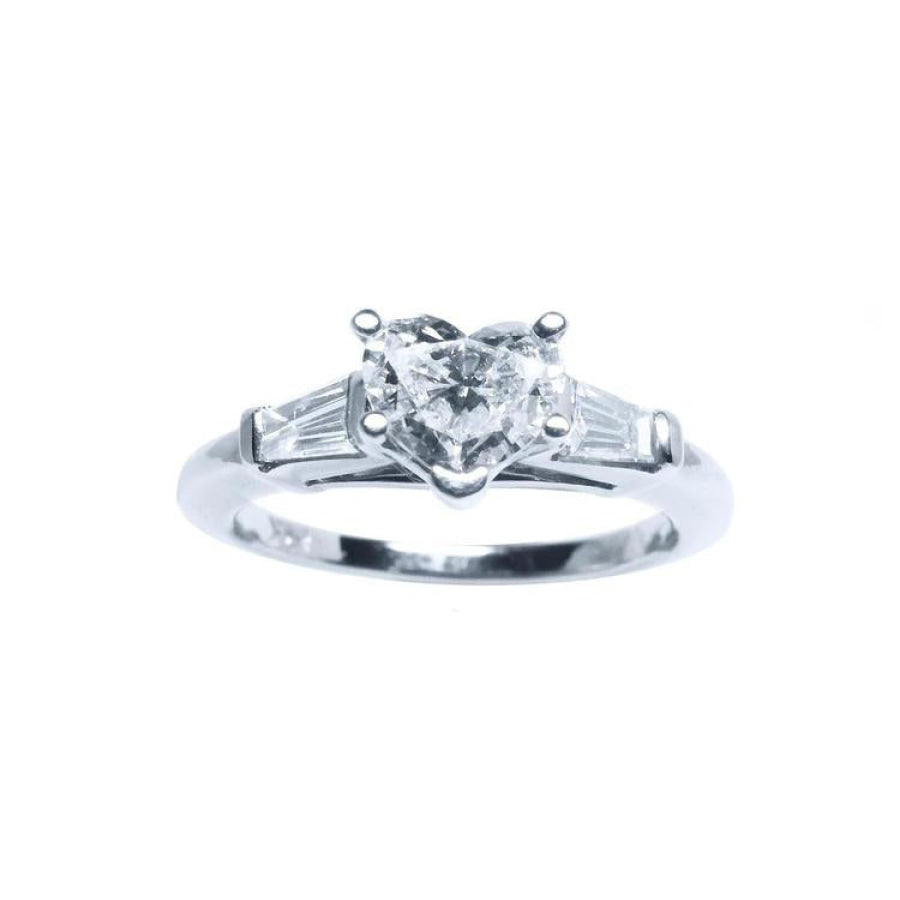 14K white gold heart-cut diamond engagement ring with side baguette diamonds.