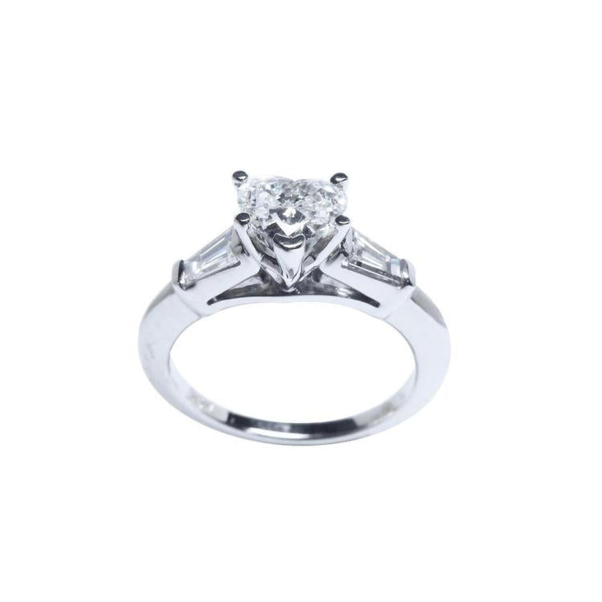 14K white gold heart-cut diamond engagement ring with side tapered baguette diamonds.
