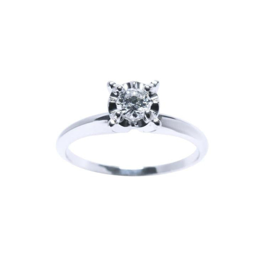 Inexpensive Diamond solitaire engagement ring in 14k whit gold.