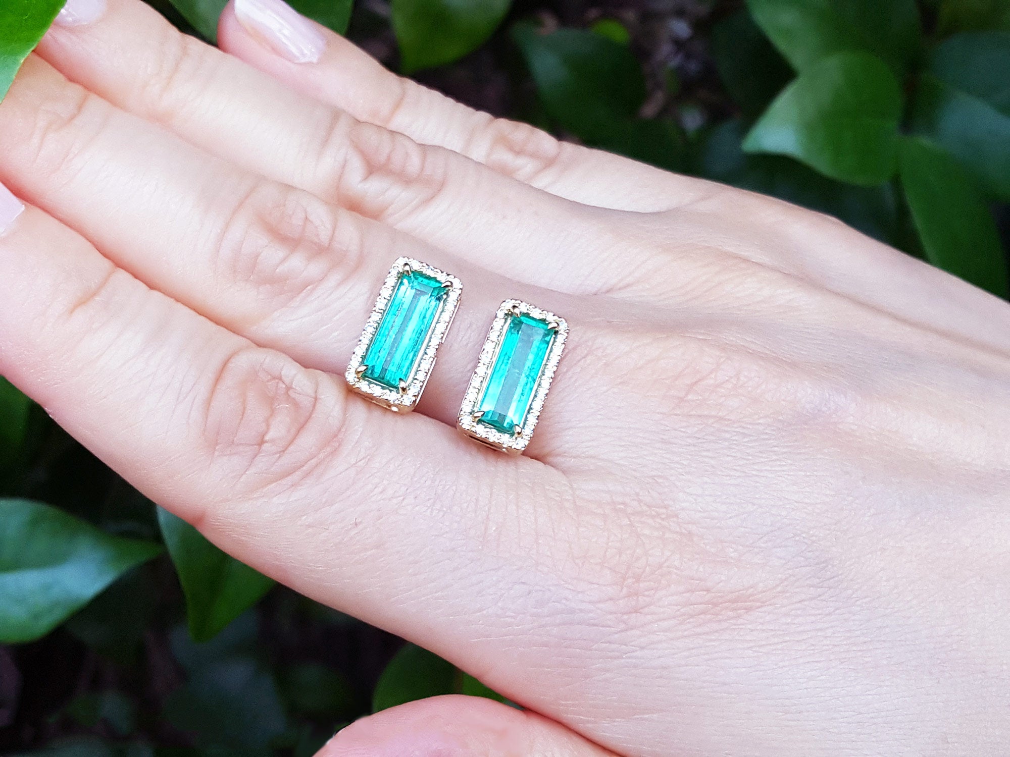 Modern emerald earrings for her