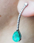 Pear cut emerald dangle earrings