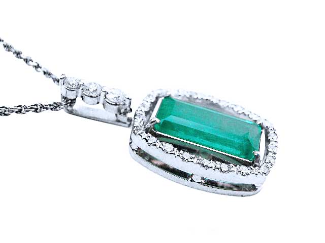 emerald and diamond dangle earrings