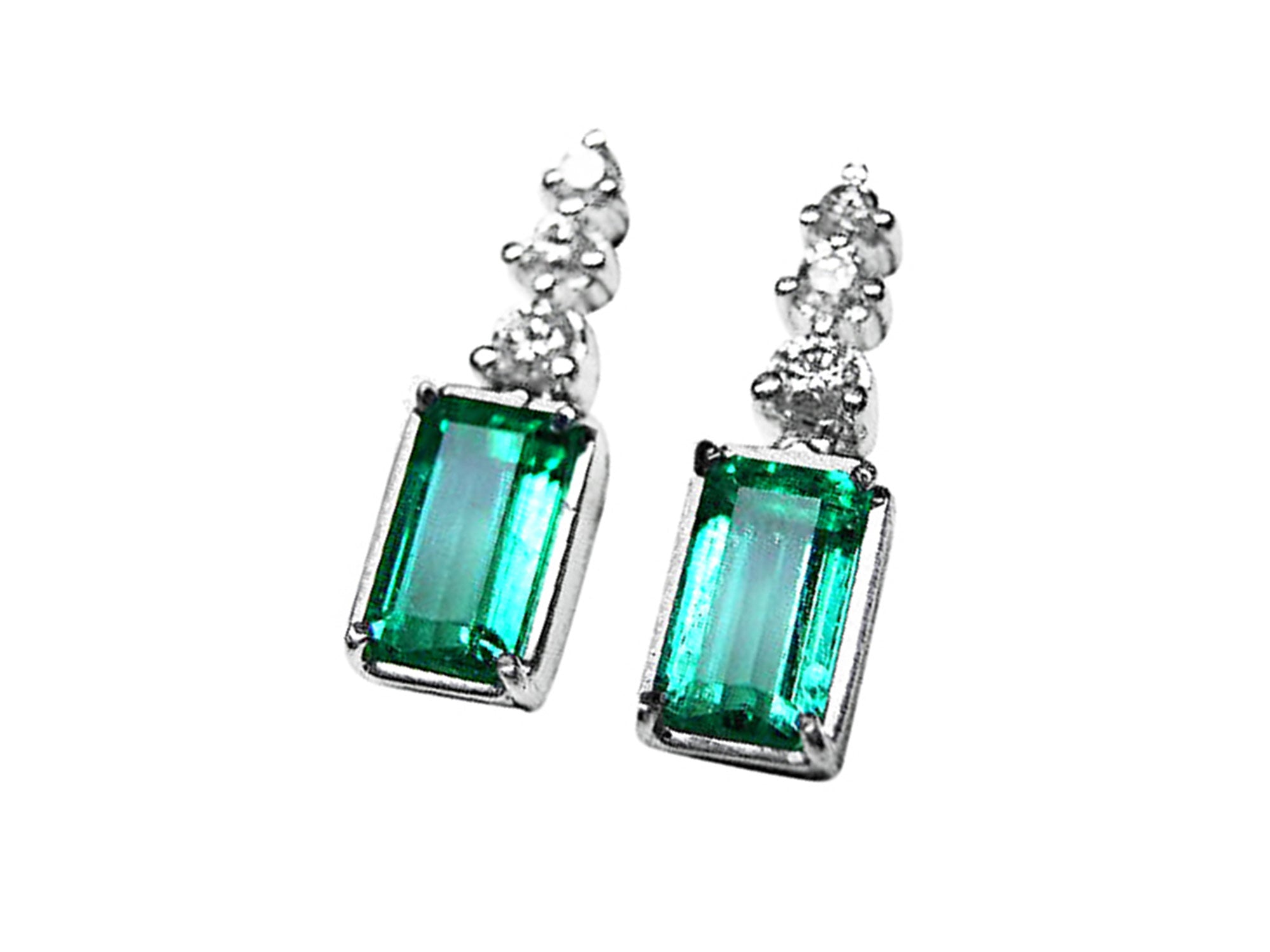 Ladies emerald earrings and pendant set