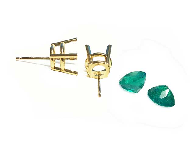 Emerald solitaire earrings